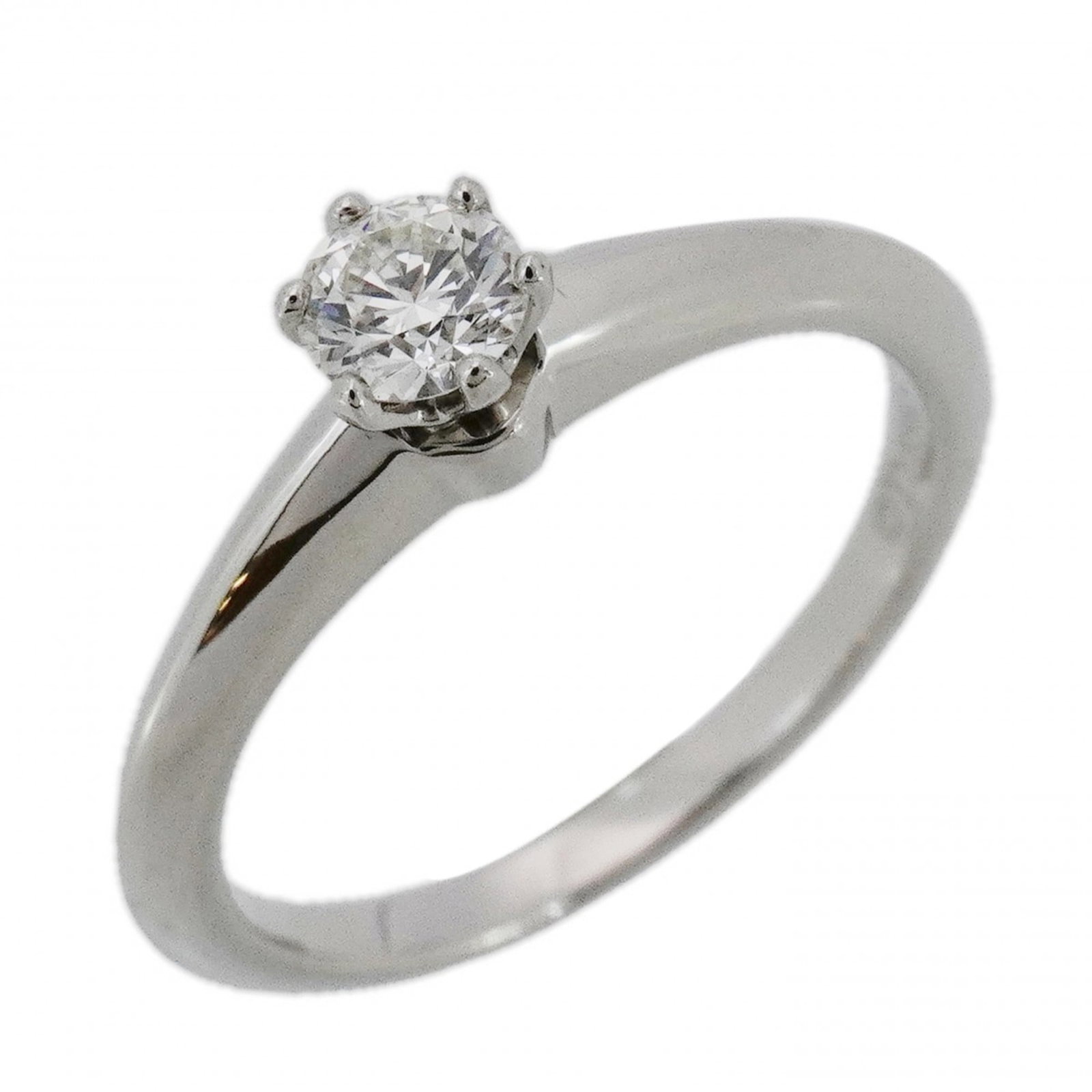 950 Tiffany Band Ring Platinum: 950 Tiffany Band Ring Platinum Experience the timeless elegance of Tiffany & Co.'s iconic platinum band ring, adorned with a stunning diamond stone. This 950 platinum masterpiece is crafted from high-