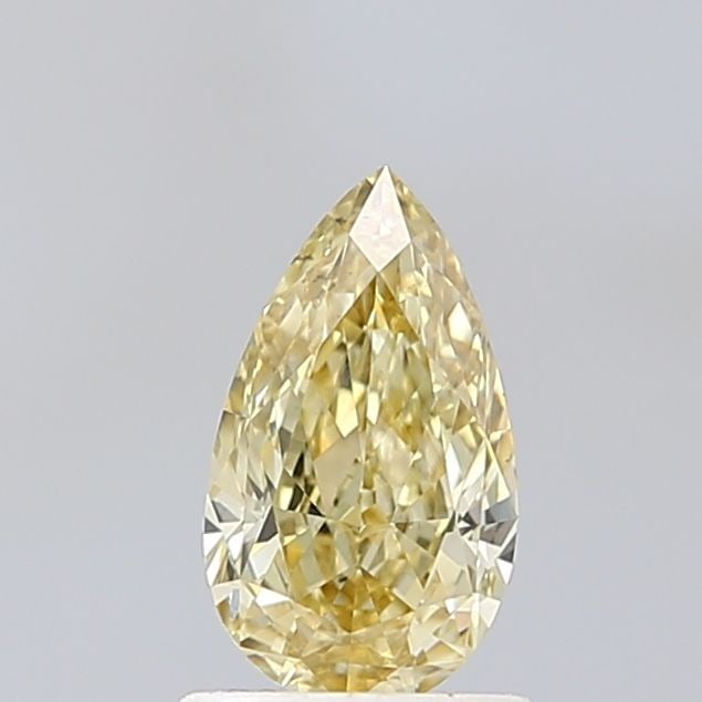 Loose Lab Diamond - IGI Pear 1.02ct Fancy Yellow VVS2: Loose Lab Diamond - IGI Pear 1.02ct Fancy Yellow VVS2 A rare and radiant gem, this 1.02ct Fancy Yellow Lab Diamond boasts exceptional clarity with a VVS2 rating, giving it an unparalleled level of