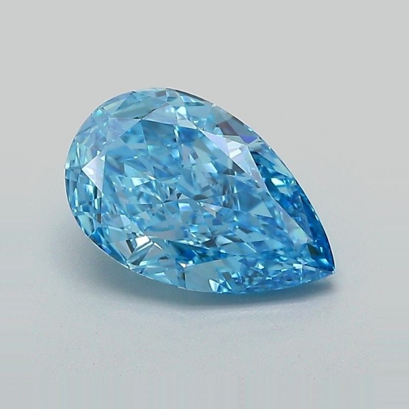 Loose Lab Diamond - IGI Pear 1.63ct Fancy Vivid Blue VVS2: Loose Lab Diamond - IGI Pear 1.63ct Fancy Vivid Blue VVS2 Experience the unparalleled beauty of a lab-grown diamond, certified by the International Gemological Institute (IGI) as Fancy Vivid Blue,