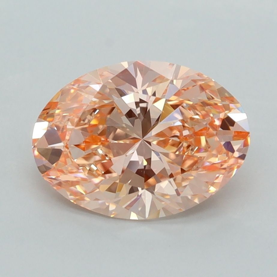IGI Oval 2.14ct Fancy Vivid Orangey Pink VVS2 Lab Diamond: IGI Oval 2.14ct Fancy Vivid Orangey Pink VVS2 Lab Diamond Experience the vibrant beauty of nature in this stunning 2.14ct Fancy Vivid Orangey Pink VVS2 lab diamond, certified by the International Gemo