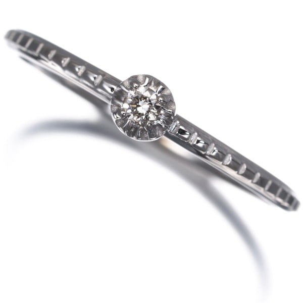 Agete 0.03ct White Gold 18k US5 Solitaire Diamond Ring: Agete 0.03ct White Gold 18k US5 Solitaire Diamond Ring A stunning 0.03ct natural diamond solitaire shines brightly in this elegant 18k white gold US5 ring, crafted with precision and care by skilled J