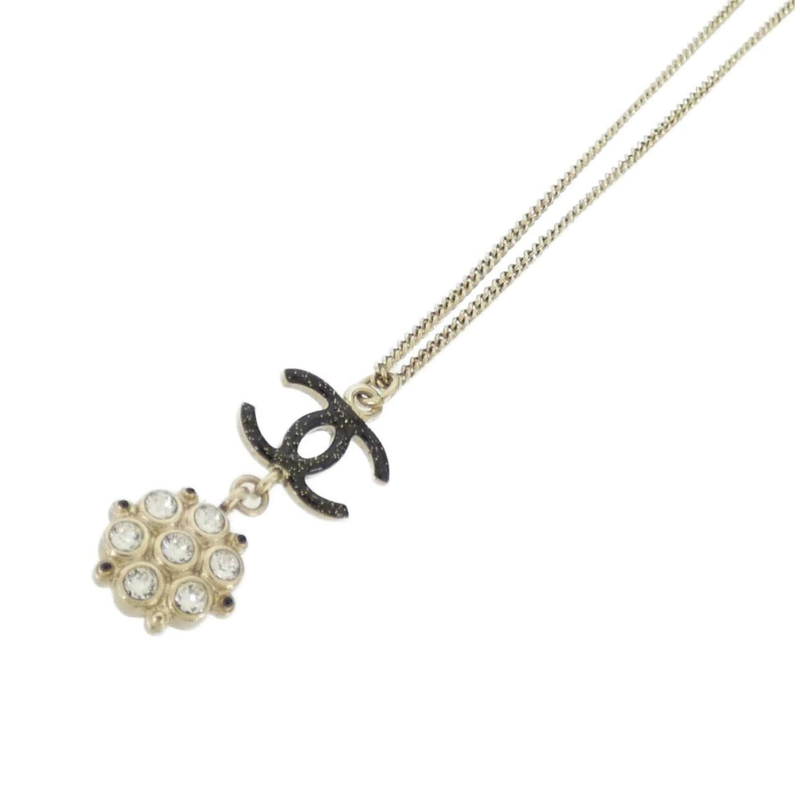 Necklace Chanel AB2360: Necklace Chanel AB2360 A stunning Chanel necklace in sleek black and gold, adorned with crystal accents that catch the light. This timeless piece boasts a versatile 42-60cm chain length, perfect for d