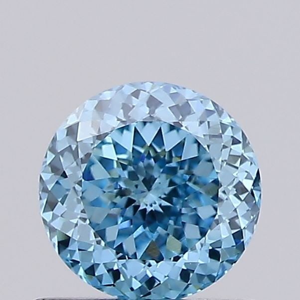 IGI Round 0.8ct Fancy Vivid Blue VVS2 Loose Lab Diamond: IGI Round 0.8ct Fancy Vivid Blue VVS2 Loose Lab Diamond Experience the breathtaking beauty of a lab-grown Fancy Vivid Blue diamond, certified by IGI as 0.8ct VVS2 in excellent condition. Its vibrant