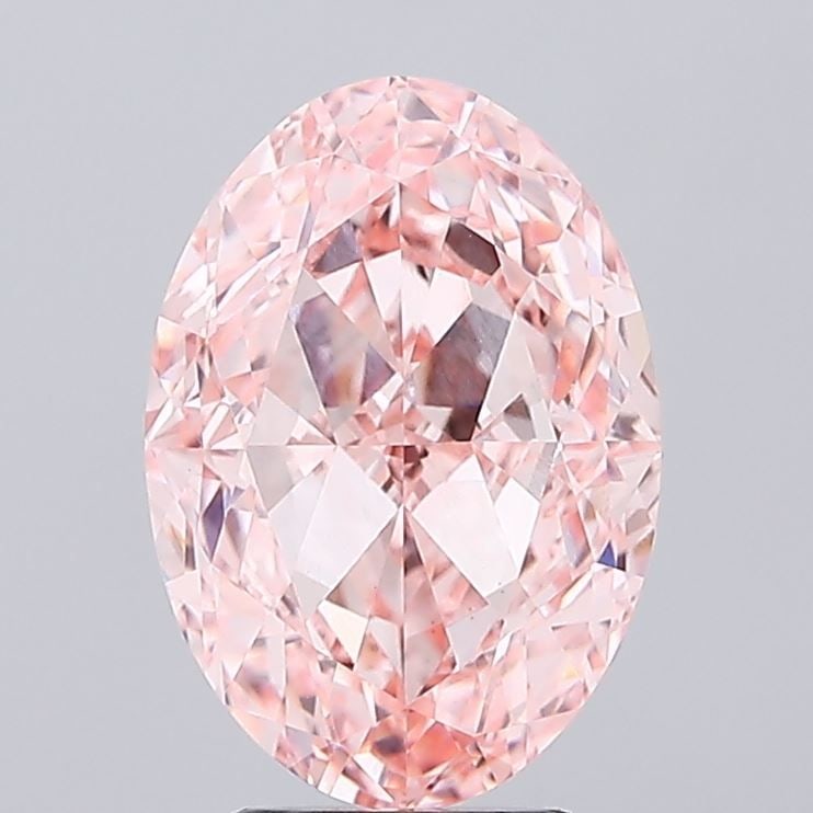 IGI Oval 5.21ct Fancy Vivid Pink VVS2 Loose Lab Diamond: IGI Oval 5.21ct Fancy Vivid Pink VVS2 Loose Lab Diamond Experience the rare beauty of a Fancy Vivid Pink lab diamond, certified by IGI and boasting exceptional clarity (VVS2) and polish (EX). This stu