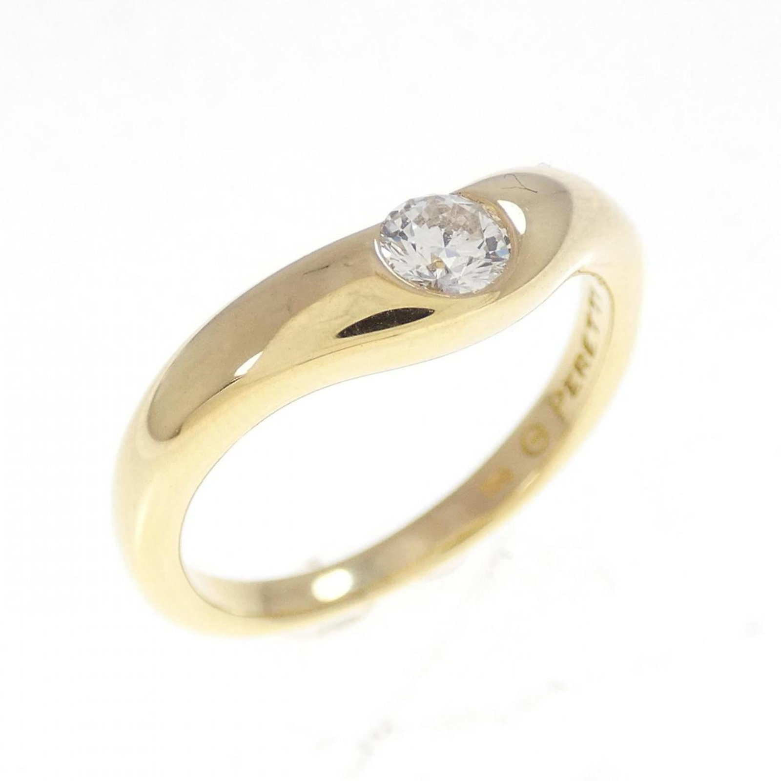 (18K) Tiffany Band Ring Yellow Gold: (18K) Tiffany Band Ring Yellow Gold A stunning 18K yellow gold Tiffany band ring, adorned with a beautiful diamond, adds a touch of elegance to any outfit. With its classic design and high-quality mat