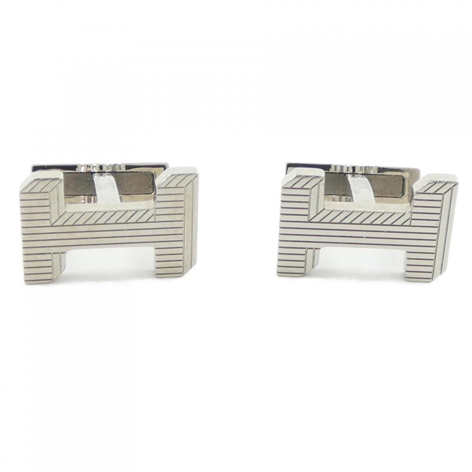 Hermes cufflinks: Hermes cufflinks Elevate your style with these exquisite Hermes cufflinks, crafted from sterling silver and boasting a classic 12mm x 18mm design that exudes timeless sophistication. With their subtle