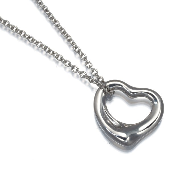 Tiffany & Co. 950 Platinum Open Heart Necklace: Tiffany & Co. 950 Platinum Open Heart Necklace Elegance and sophistication meet in this stunning 950 platinum open heart necklace, crafted by the renowned Tiffany & Co. Brand. The sleek, modern design