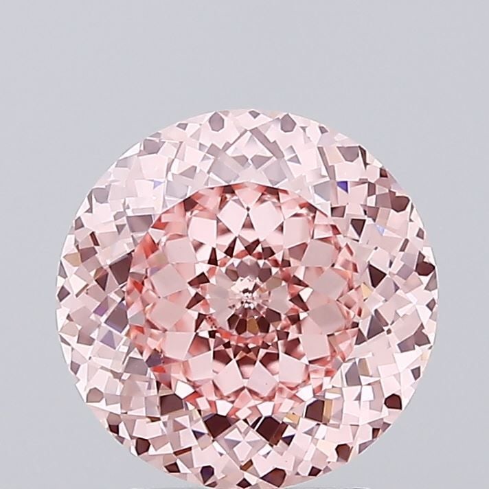 IGI Round 3.04ct Fancy Intense Pink VVS2 Loose Lab Diamond: IGI Round 3.04ct Fancy Intense Pink VVS2 Loose Lab Diamond Experience the rare beauty of a Fancy Intense Pink diamond, one of the most coveted colors in the world of gemstones. This exquisite 3.04ct l
