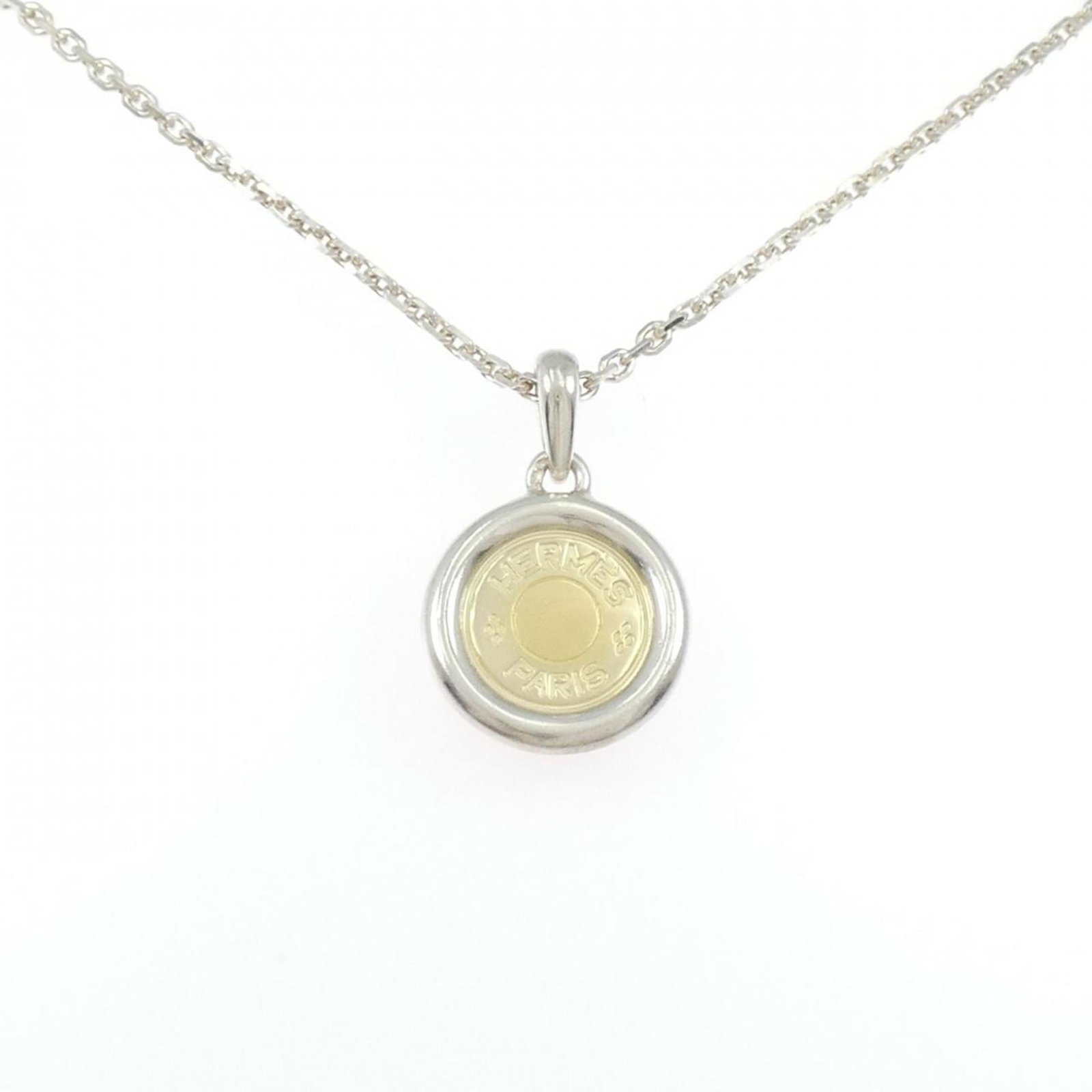 Necklace Hermes Sellier: Necklace Hermes Sellier A stunning silver 925 Hermes Sellier necklace, featuring a beautiful pendant with intricate details, is up for grabs. With its classic design and timeless elegance, this piece