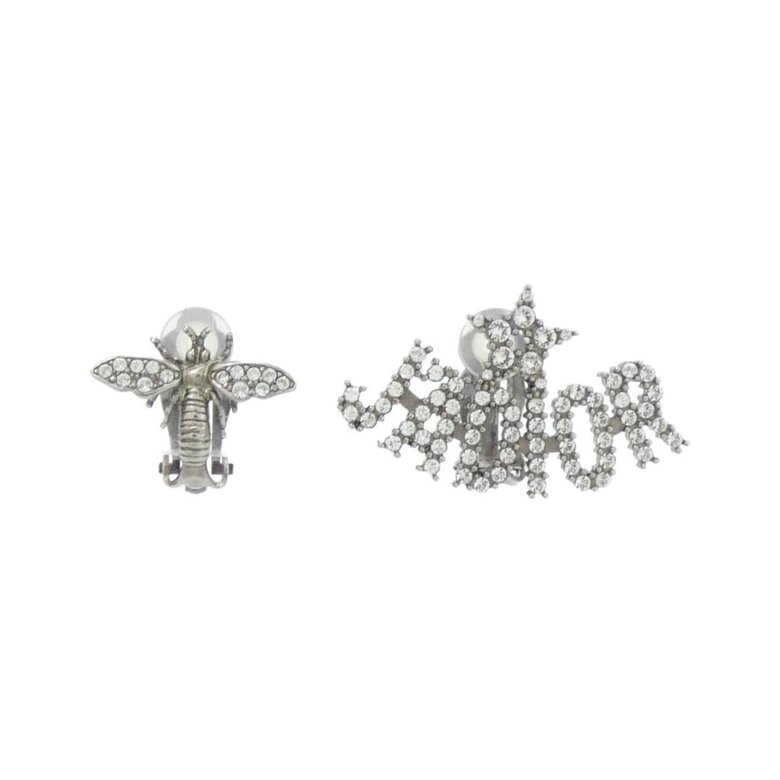 Dior Clip Earrings: Dior Clip Earrings Elevate your everyday look with these stunning Dior clip earrings, featuring sleek clear design that adds a touch of sophistication to any outfit. Made from high-quality materials,