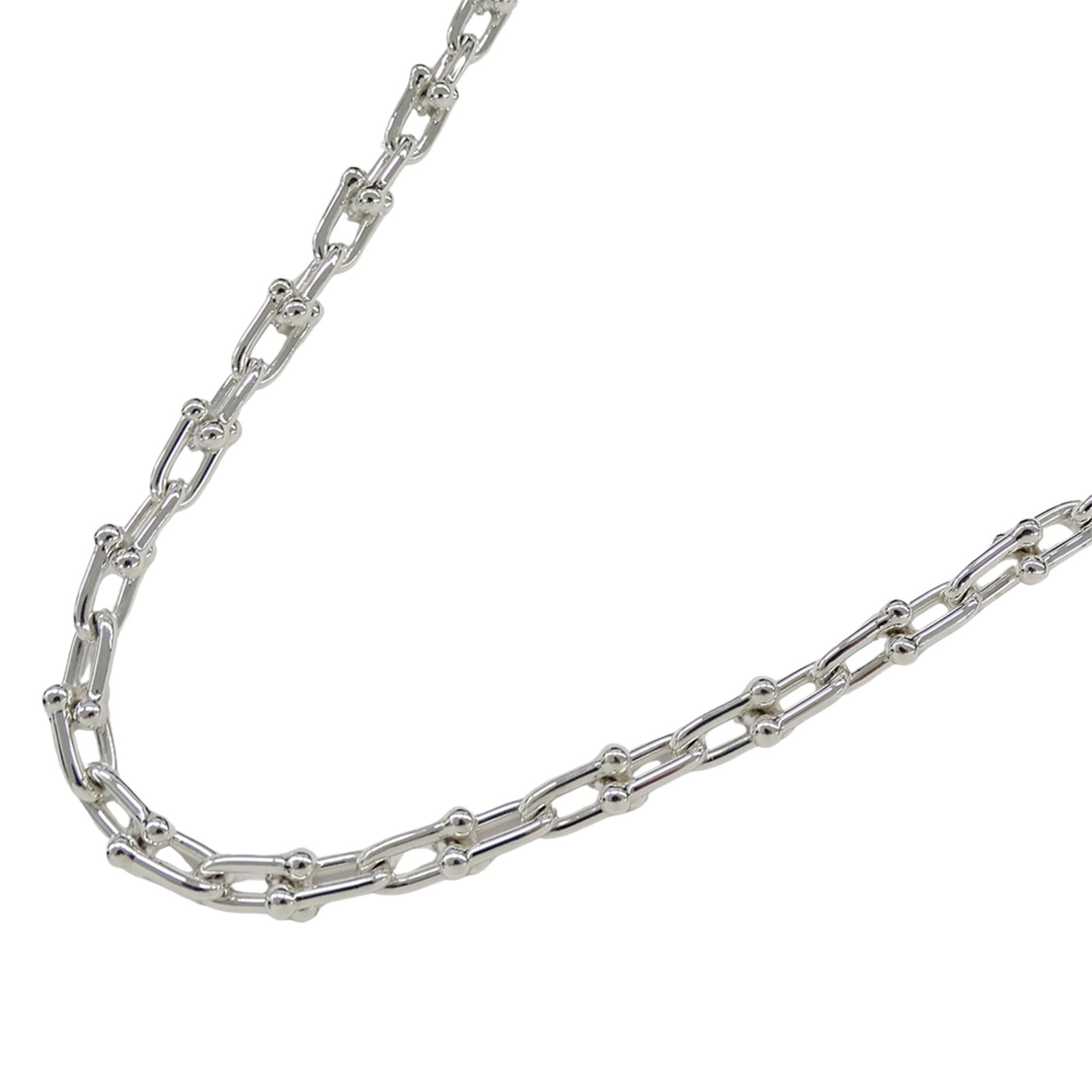 Polished. - Tiffany & Co. Women's Necklace - Brand Name - SV925 - Hardware - Small Link - Silver: Polished. - Tiffany & Co. Women's Necklace - Brand Name - SV925 - Hardware - Small Link - Silver Jewelry A stunning Tiffany & Co. necklace, crafted from sterling silver (925) with a delicate small lin