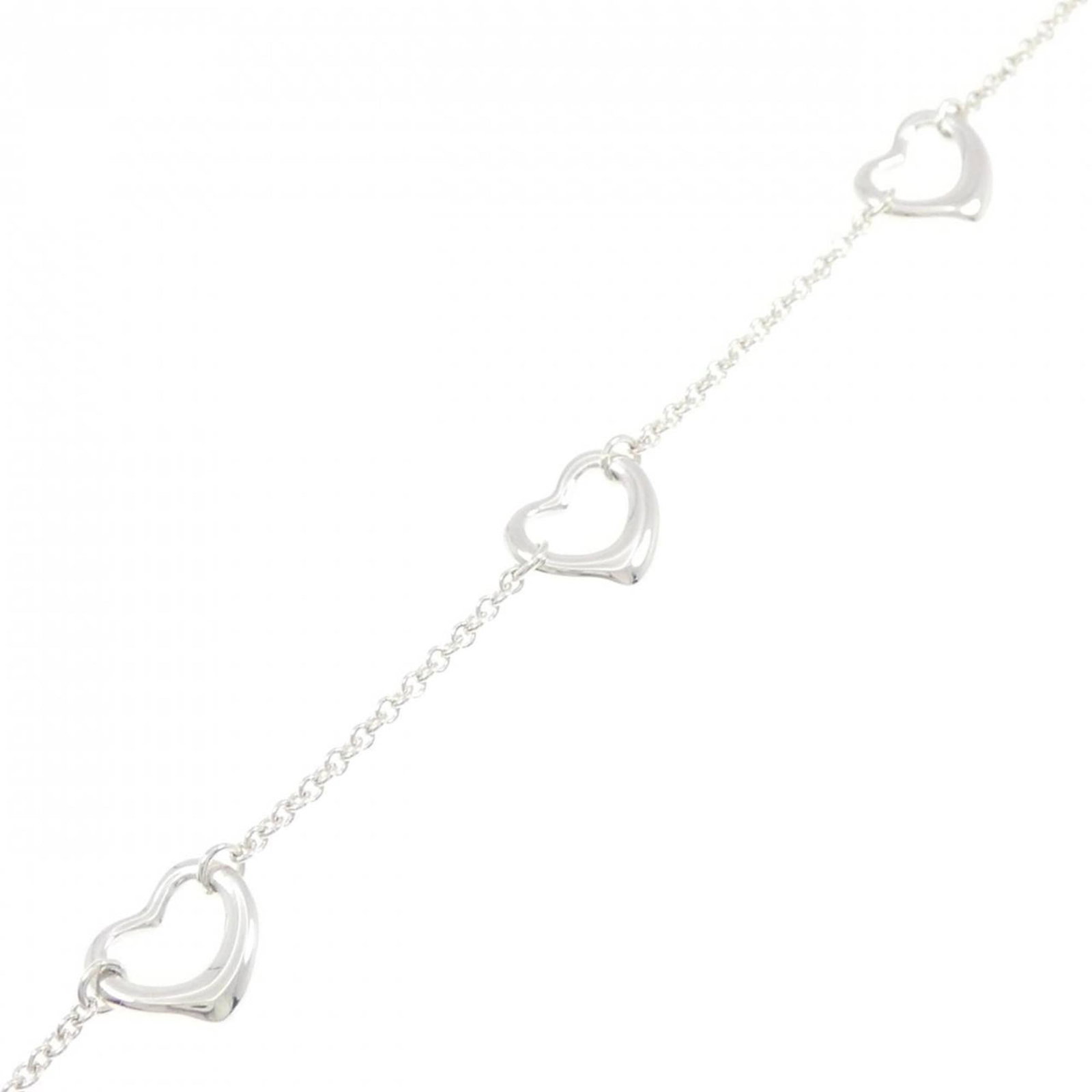 925 Tiffany Charm Bracelet Silver: 925 Tiffany Charm Bracelet Silver A beautiful 925 Tiffany charm bracelet in excellent condition, with a slender 9.1mm width and comfortable 18cm length, making it perfect for everyday wear. The silver