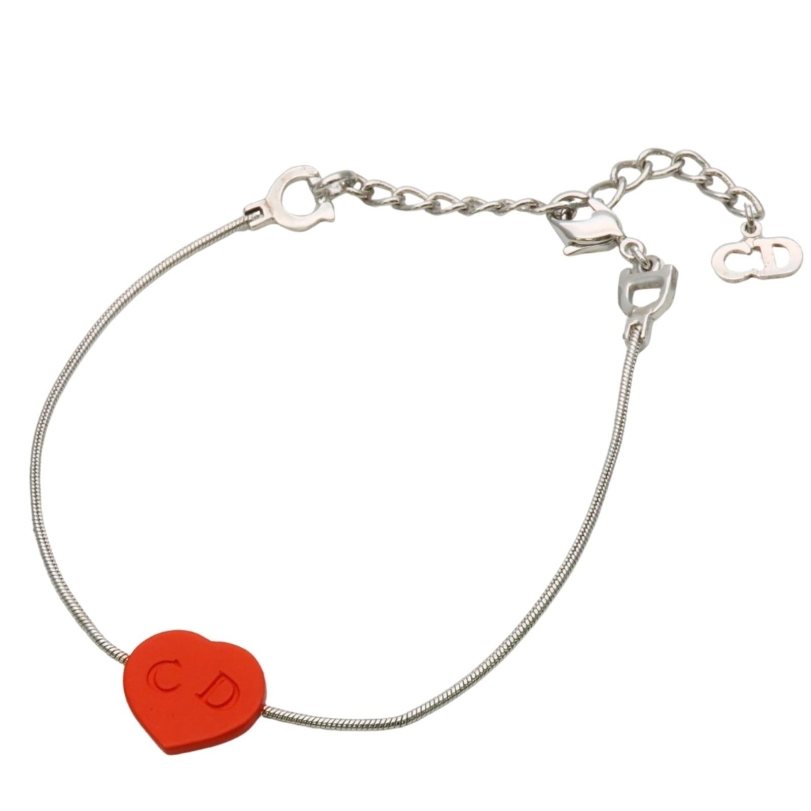 Christian Dior Charm Metal Bracelet: Christian Dior Charm Metal Bracelet A stunning red charm metal bracelet from Christian Dior, adding a pop of vibrant color to any outfit. With its sleek silver tone and delicate design, this 23cm leng