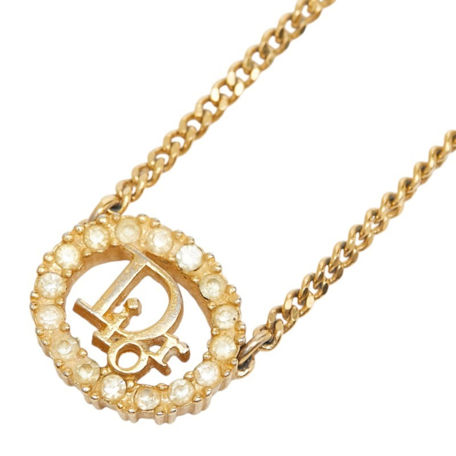 Christian Dior Logo Necklace in Gold with Plated Rhinestones for Women: Christian Dior Logo Necklace in Gold with Plated Rhinestones for Women Elevate your style with the iconic Christian Dior logo necklace, featuring 13.4mm x 15.7mm gold-plated rhinestones that add a tou