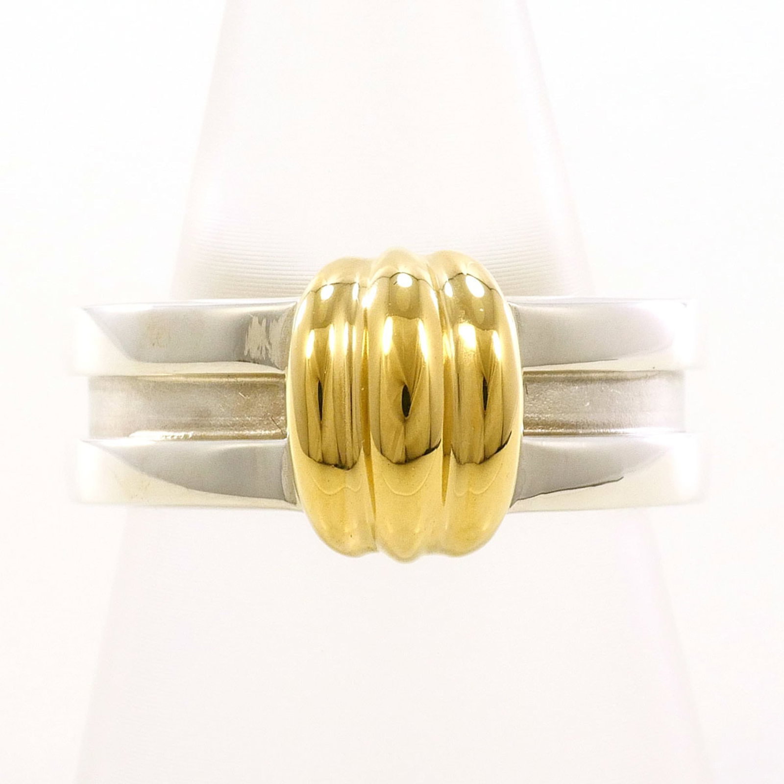 Yellow Gold (18K) - Tiffany Band Ring Silver 925: Yellow Gold (18K) - Tiffany Band Ring Silver 925 A beautiful Tiffany band ring, crafted with 18K yellow gold accents and sterling silver details, adds a touch of elegance to any outfit. This pre-loved