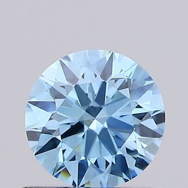 IGI Round 0.74ct Fancy Vivid Blue VVS2 Ideal Loose Lab Diamond: IGI Round 0.74ct Fancy Vivid Blue VVS2 Ideal Loose Lab Diamond Experience the breathtaking beauty of a lab-grown diamond, certified by the International Gemological Institute (IGI), with its vibrant F