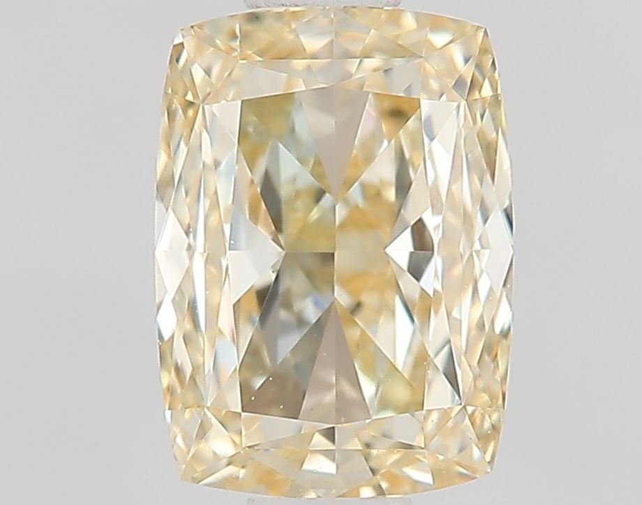 Loose Lab Diamond - IGI Cushion Modified 1.03ct Fancy Light Yellow VVS2: Loose Lab Diamond - IGI Cushion Modified 1.03ct Fancy Light Yellow VVS2 A rare and radiant gem, this 1.03ct IGI-certified lab diamond boasts an exceptional Fancy Light Yellow color, rivaling the warmt