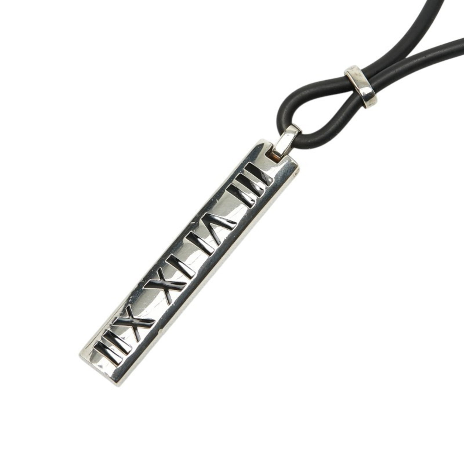 Tiffany & Co. Atlas Pendant Necklace in Silver, Black Metal & Rubber for Women: Tiffany & Co. Atlas Pendant Necklace in Silver, Black Metal & Rubber for Women Exceptional Tiffany Co Atlas Pendant Necklace available for auction. Review complete item specifications below for detail