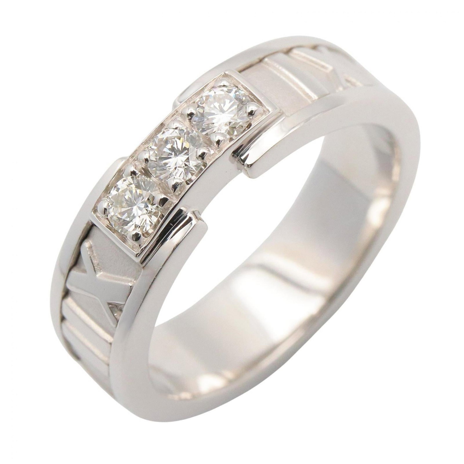 (18K) Tiffany Band Ring White Gold: (18K) Tiffany Band Ring White Gold Experience the timeless elegance of Tiffany & Co.'s iconic band ring, crafted from 18K white gold and boasting clear diamonds for a touch of understated