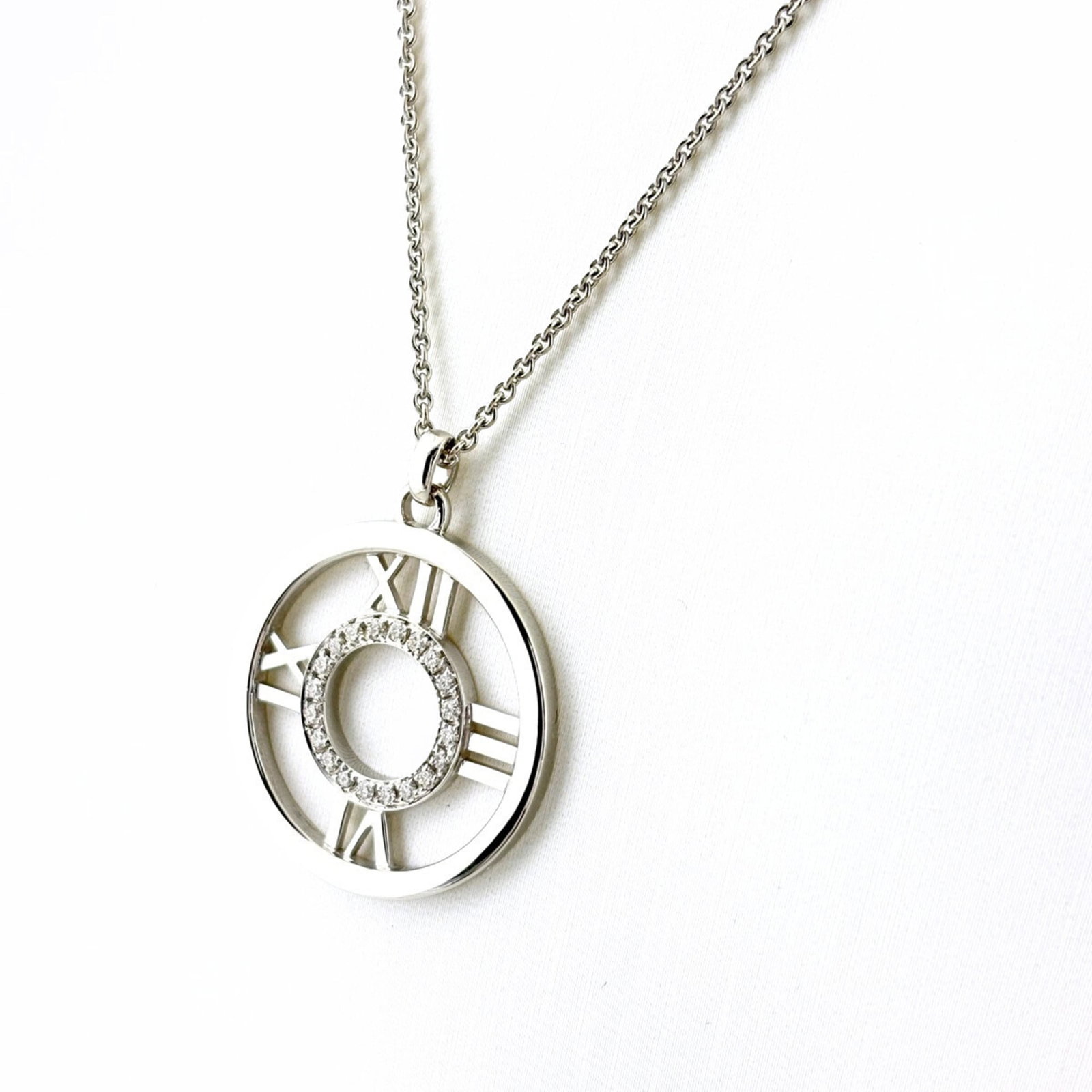 for Women - Tiffany & Co. Atlas Open Medallion Necklace Pendant with Diamonds - 750: for Women - Tiffany & Co. Atlas Open Medallion Necklace Pendant with Diamonds - 750 Elegant and sophisticated, the Tiffany & Co. Atlas Open Medallion Necklace Pendant with Diamonds is a timeless piece