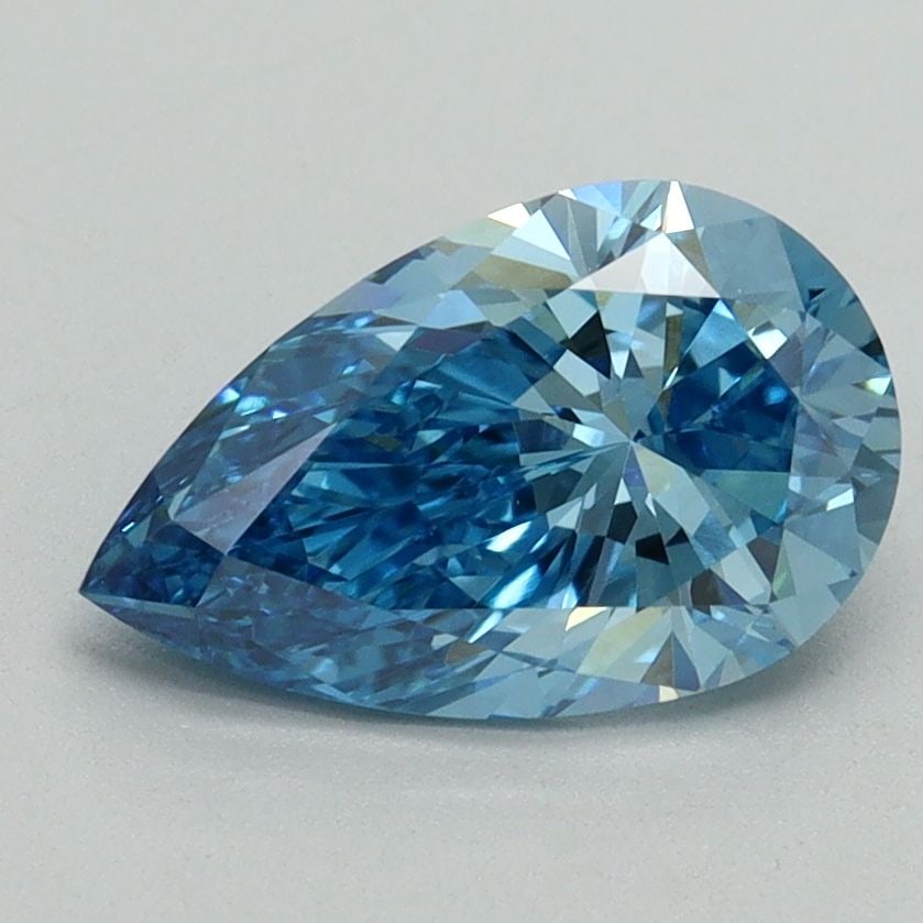 Loose Lab Diamond - IGI Pear 1.57ct Fancy Vivid Blue VVS2: Loose Lab Diamond - IGI Pear 1.57ct Fancy Vivid Blue VVS2 Experience the breathtaking beauty of a lab-grown diamond, certified by the International Gemological Institute (IGI) as Fancy Vivid Blue, wit