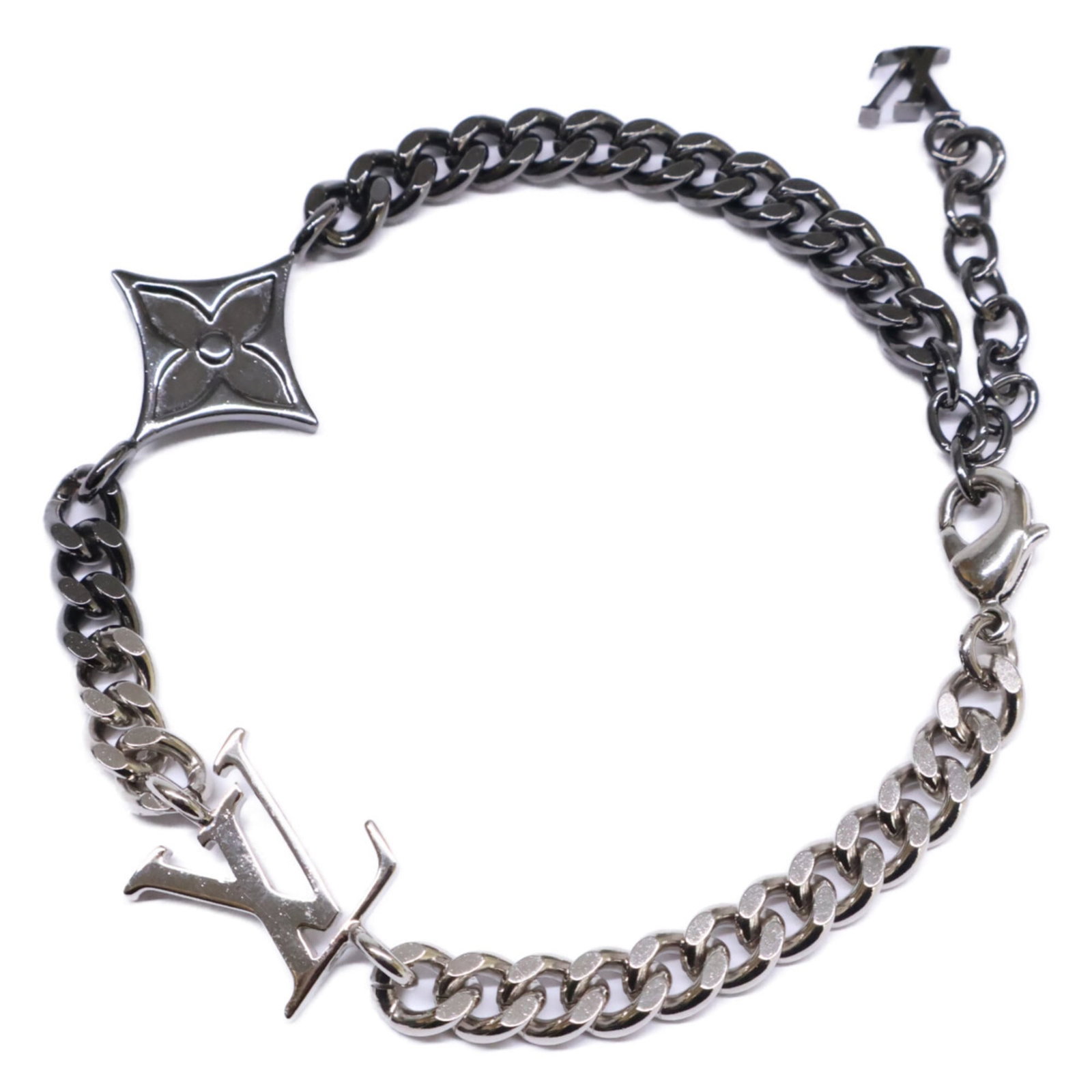 Louis Vuitton Charm Metal Bracelet: Louis Vuitton Charm Metal Bracelet A sleek and sophisticated accessory for the modern man, this Louis Vuitton Charm Metal Bracelet boasts a striking gunmetal finish and silver accents, adding a touch