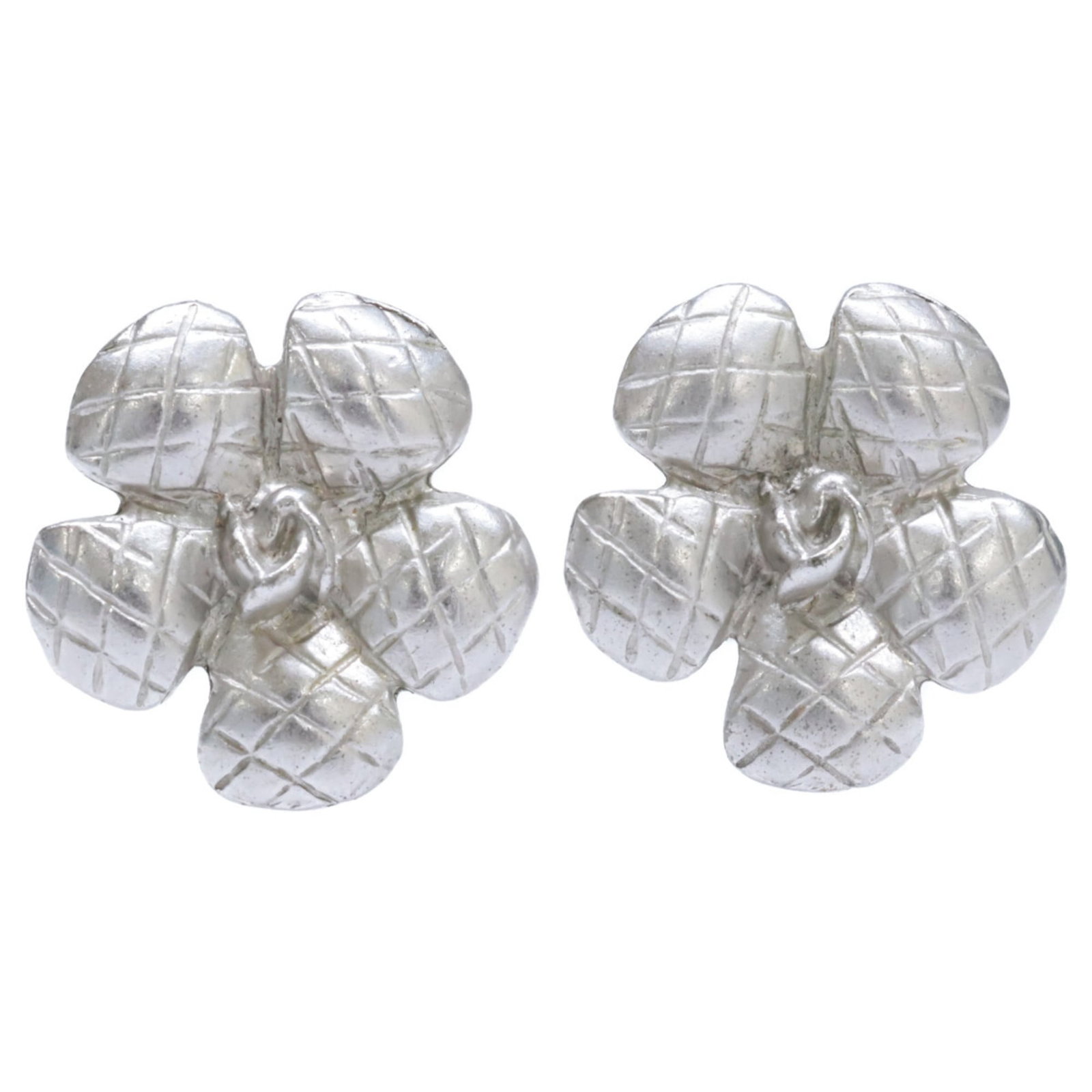 Chanel Clip Earrings in Metal: Chanel Clip Earrings in Metal Elevate your everyday style with these sleek Chanel clip earrings in silver metal, featuring the iconic interlocking CC logo. With their understated elegance and durable