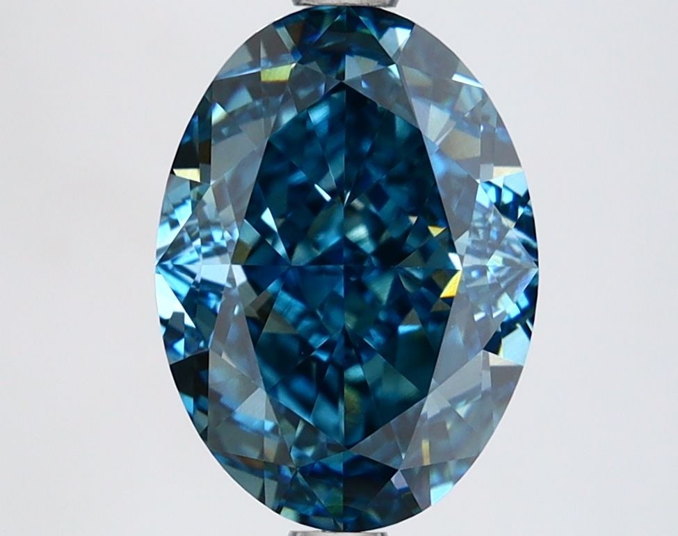 IGI Oval 3.14ct Fancy Vivid Blue VVS2 Loose Lab Diamond: IGI Oval 3.14ct Fancy Vivid Blue VVS2 Loose Lab Diamond Experience the breathtaking beauty of a Fancy Vivid Blue diamond, one of the rarest and most coveted colors in nature. This 3.14ct lab-grown