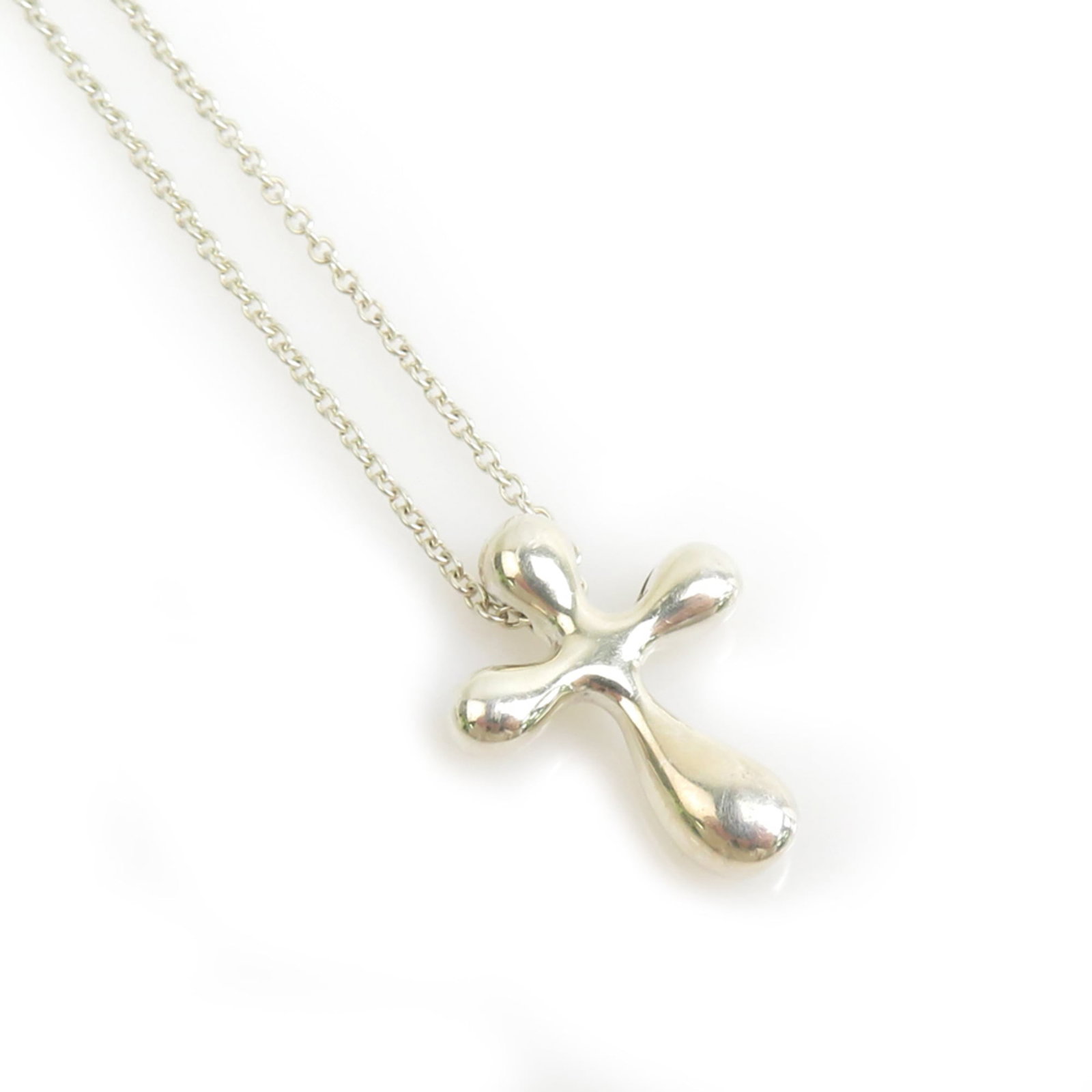 Tiffany & Co. Cross Necklace in 925 Sterling Silver for Women, Free Shipping: Tiffany & Co. Cross Necklace in 925 Sterling Silver for Women, Free Shipping Elevate your style with the timeless elegance of Tiffany & Co.'s sterling silver cross necklace, perfect for everyday wear.
