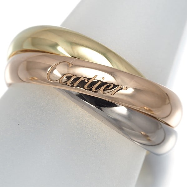Gold Cartier Ring Trinity 3Color Classic Eu52 18K 750 Yellow White Rose: Gold Cartier Ring Trinity 3Color Classic Eu52 18K 750 Yellow White Rose A stunning Cartier Trinity ring, crafted from 18k multi-tone gold, boasts a classic design that exudes timeless elegance. With n