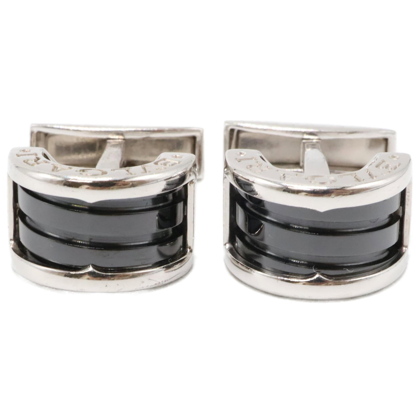 Bvlgari Silver 925 Cufflinks: Bvlgari Silver 925 Cufflinks Elevate your style with these luxurious Bvlgari silver cufflinks, crafted from high-quality 925 sterling silver and boasting a sleek black finish that adds a touch of soph