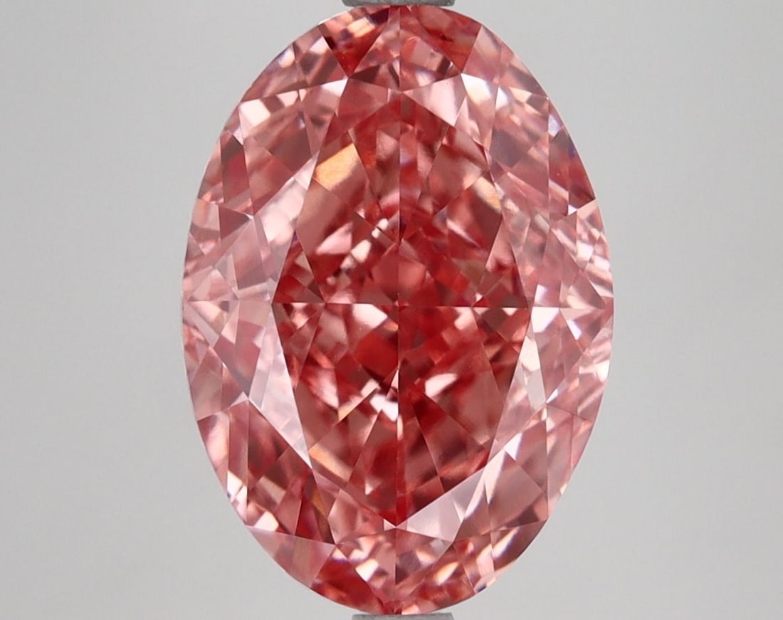 IGI Oval 4.88ct Fancy Vivid Pink VVS2 Loose Lab Diamond: IGI Oval 4.88ct Fancy Vivid Pink VVS2 Loose Lab Diamond Experience the rare beauty of a Fancy Vivid Pink diamond, one of the most coveted colors in the world of gemstones. This exceptional 4.88ct lab-