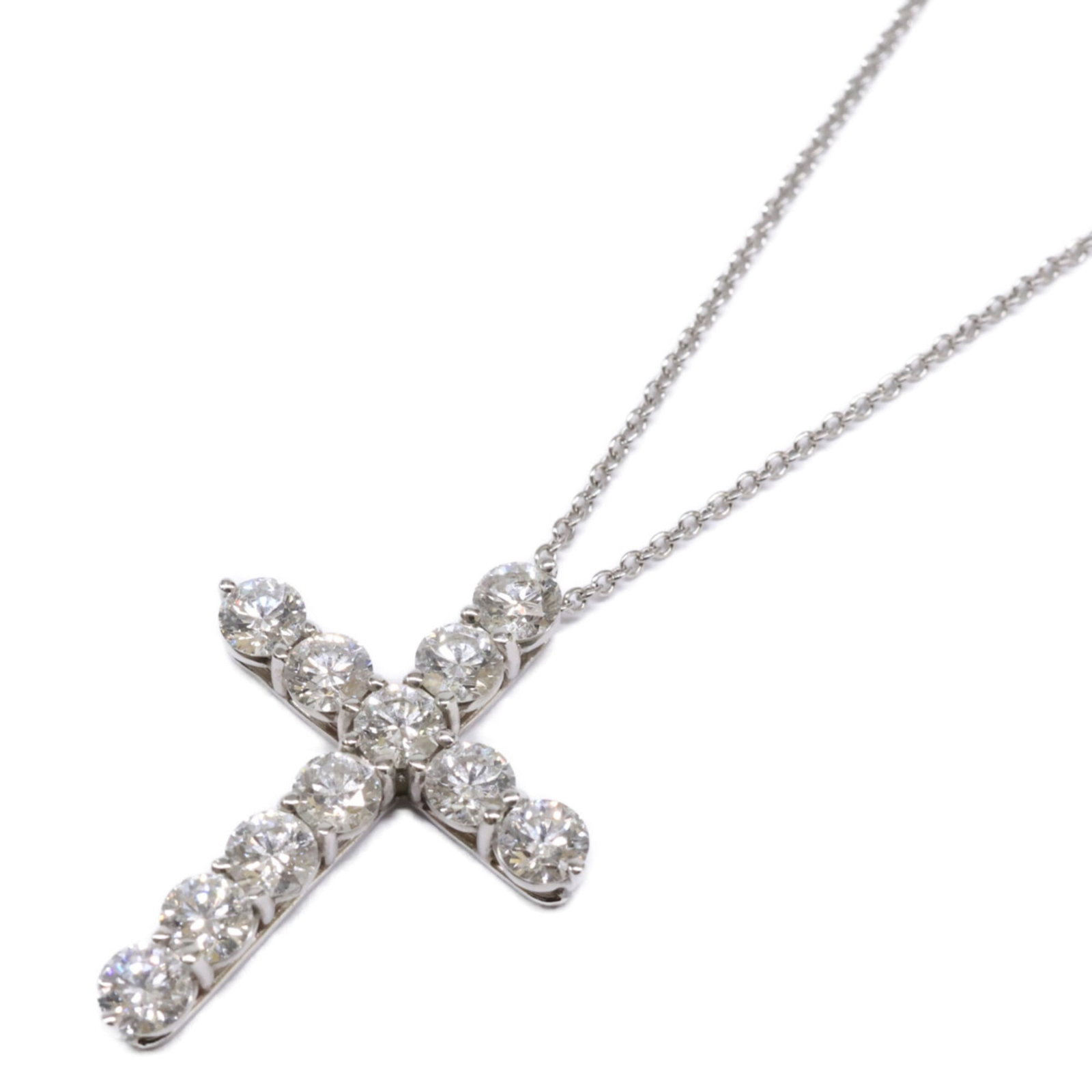 Tiffany & Co. Tiffany PT950 Large Cross Diamond Necklace in Silver for Women: Tiffany & Co. Tiffany PT950 Large Cross Diamond Necklace in Silver for Women Experience the timeless elegance of Tiffany & Co.'s iconic cross diamond necklace, crafted from platinum 950 and set with s