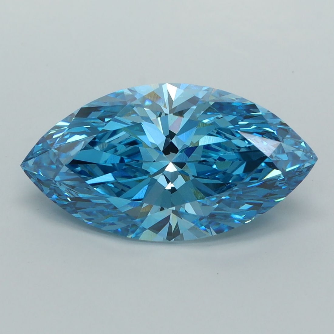 IGI Marquise 4.02ct Fancy Vivid Blue VVS2 Loose Lab Diamond: IGI Marquise 4.02ct Fancy Vivid Blue VVS2 Loose Lab Diamond Experience the breathtaking beauty of a Fancy Vivid Blue lab-grown diamond, certified by IGI and boasting an exceptional 4.02ct cut with EX