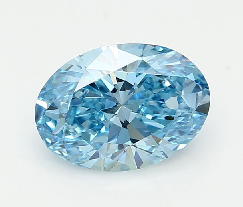 IGI Oval 2.0ct Fancy Vivid Blue VVS2 Loose Lab Diamond: IGI Oval 2.0ct Fancy Vivid Blue VVS2 Loose Lab Diamond Experience the breathtaking beauty of a lab-grown Fancy Vivid Blue diamond, certified by the International Gemological Institute (IGI) as VVS2 in