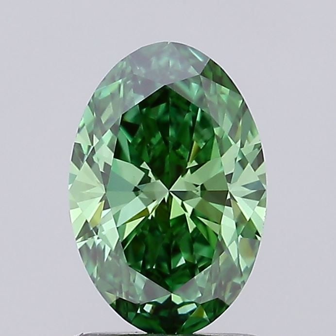 IGI Oval 1.06ct Fancy Vivid Green VVS2 Loose Lab Diamond: IGI Oval 1.06ct Fancy Vivid Green VVS2 Loose Lab Diamond Experience the rare beauty of a Fancy Vivid Green lab-grown diamond, certified by the International Gemological Institute (IGI). This exception