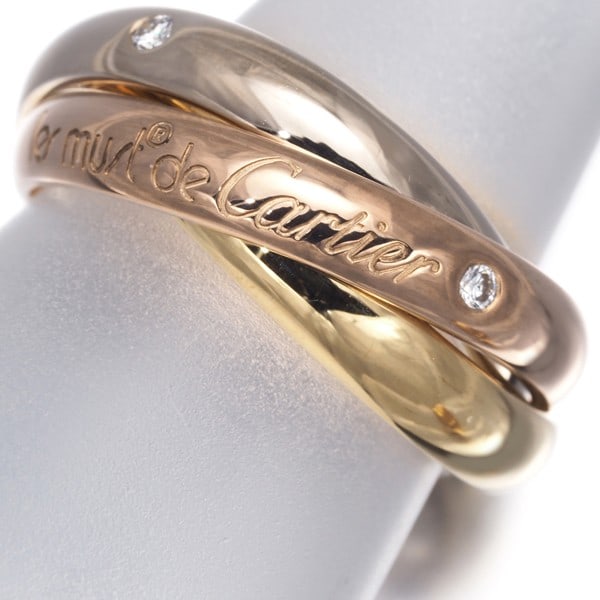 Rg Cartier Ring Diamond Trinity 3Color Classic Eu52 18K Yg/ Wg/: Rg Cartier Ring Diamond Trinity 3Color Classic Eu52 18K Yg/ Wg/ A stunning Cartier ring, crafted in 18k multi-tone gold, showcases three natural diamonds of exceptional quality, set against a rich bac