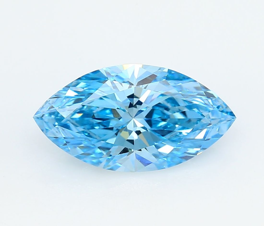 IGI Marquise 3.0ct Fancy Vivid Blue VVS2 Loose Lab Diamond: IGI Marquise 3.0ct Fancy Vivid Blue VVS2 Loose Lab Diamond Experience the breathtaking beauty of a Fancy Vivid Blue diamond, one of the rarest and most coveted colors in nature. This exquisite 3.0ct l