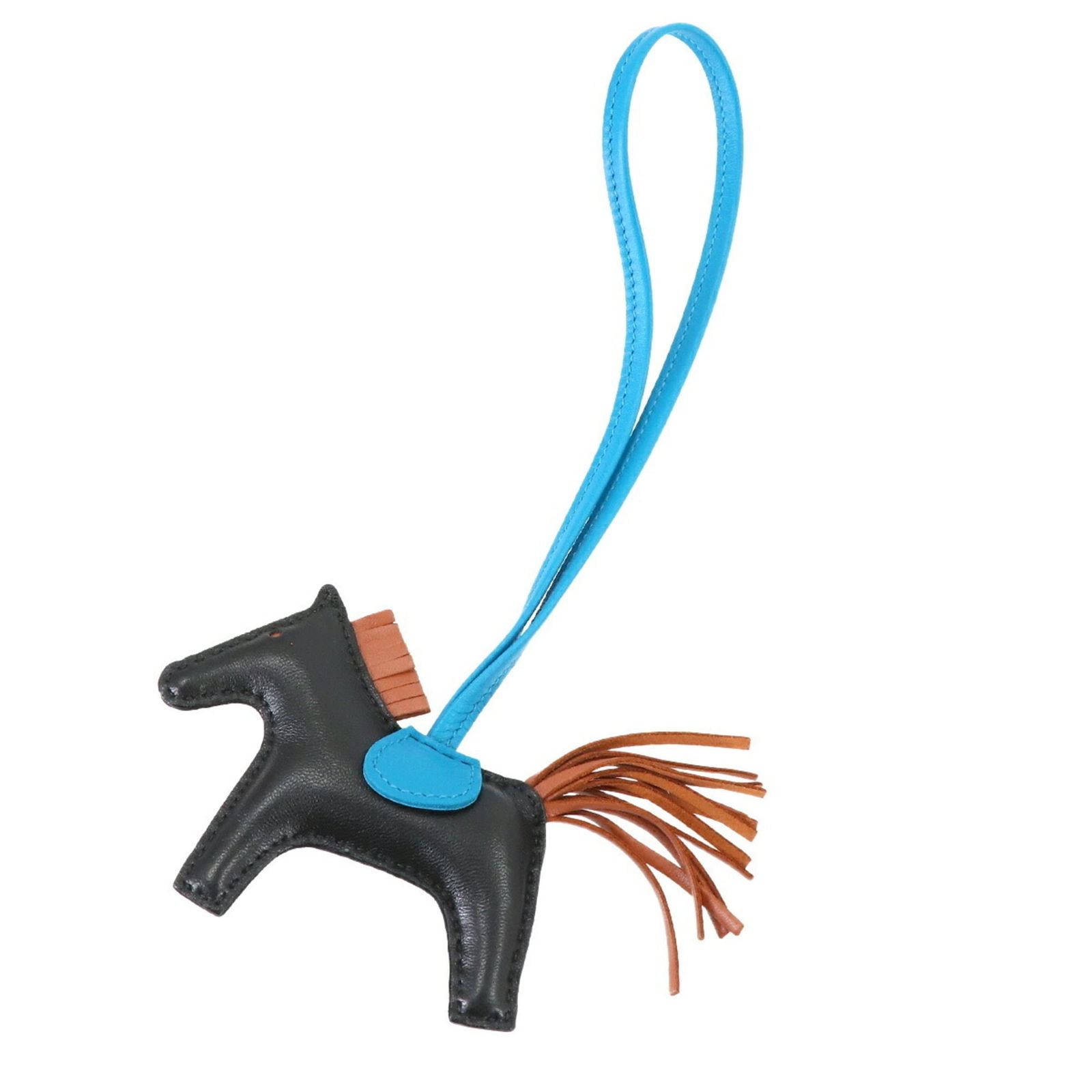 Hermes Agneau Milo Handbag Charm: Hermes Agneau Milo Handbag Charm Add a touch of luxury to your accessories with the iconic Hermes Agneau Milo handbag charm, crafted from high-quality Agneau Milo material and boasting sleek black hue