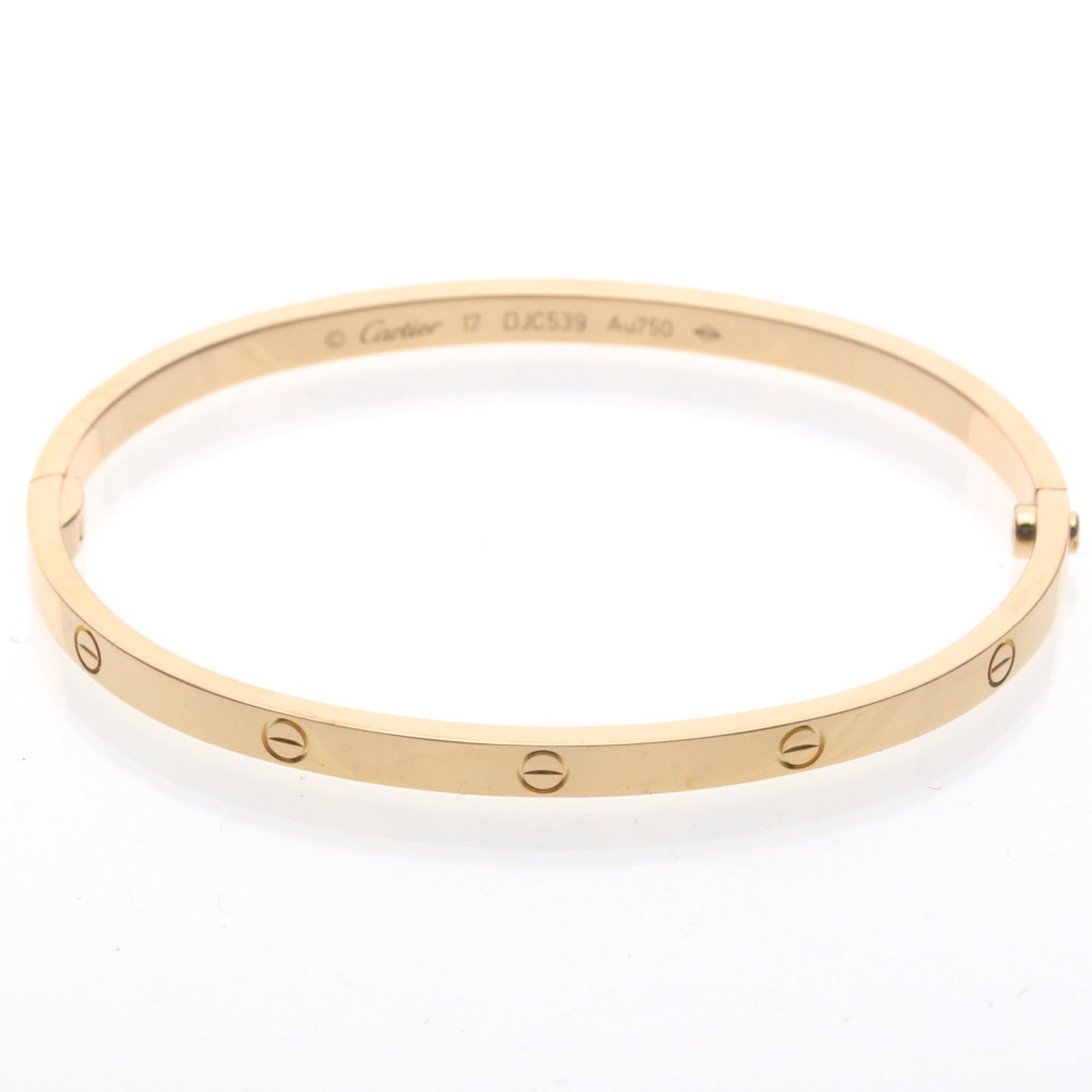 Pink Gold 18K Cartier Bangle: Pink Gold 18K Cartier Bangle A stunning pink gold Cartier bangle, 18K in purity and crafted from luxurious gold, adds a touch of elegance to any outfit. With its sleek design and subtle shine, this be