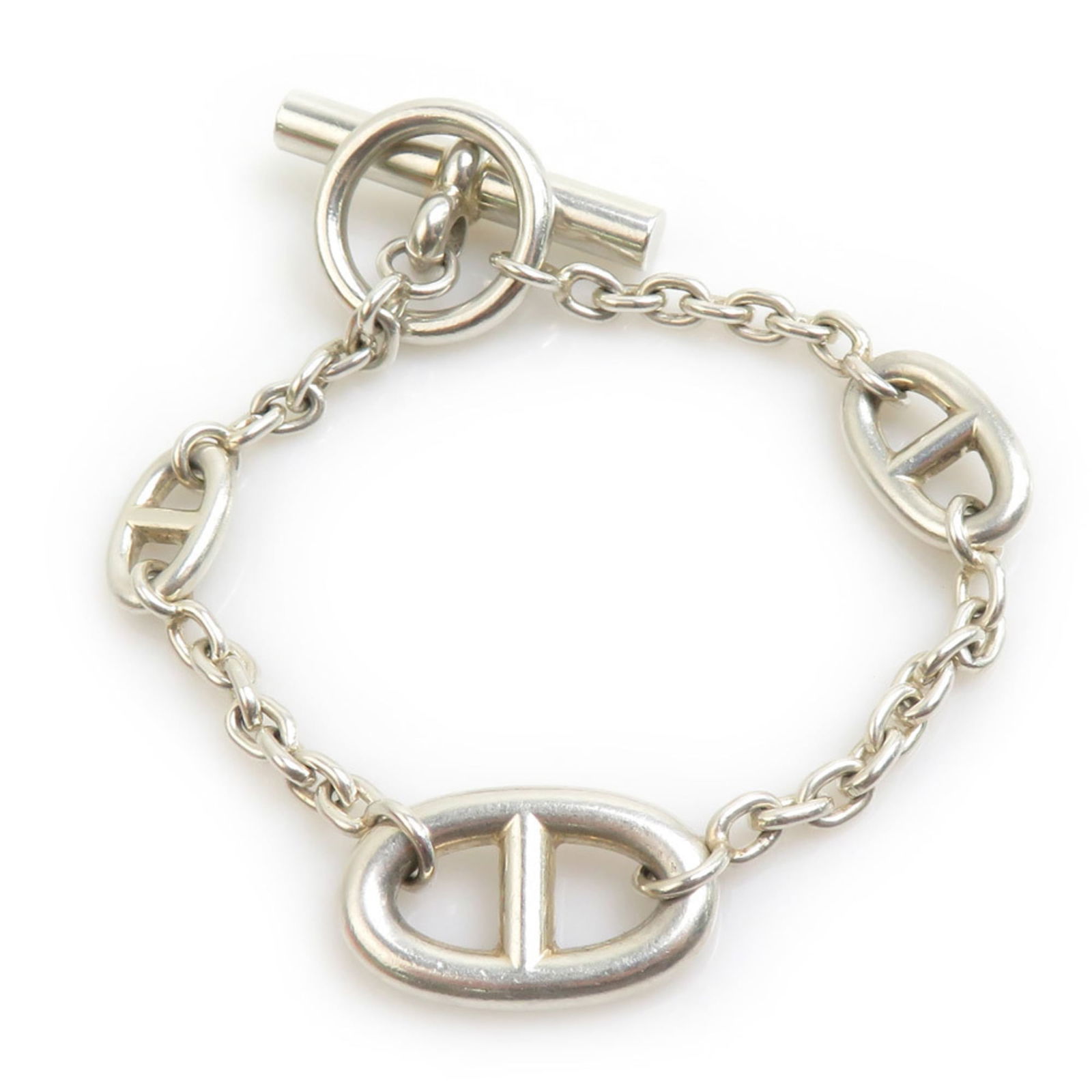 Hermes Silver 925 Charm Bracelet: Hermes Silver 925 Charm Bracelet Elevate your style with the timeless elegance of an authentic Hermes Silver 925 Charm Bracelet, boasting a sleek and sophisticated design that exudes luxury. This pre-