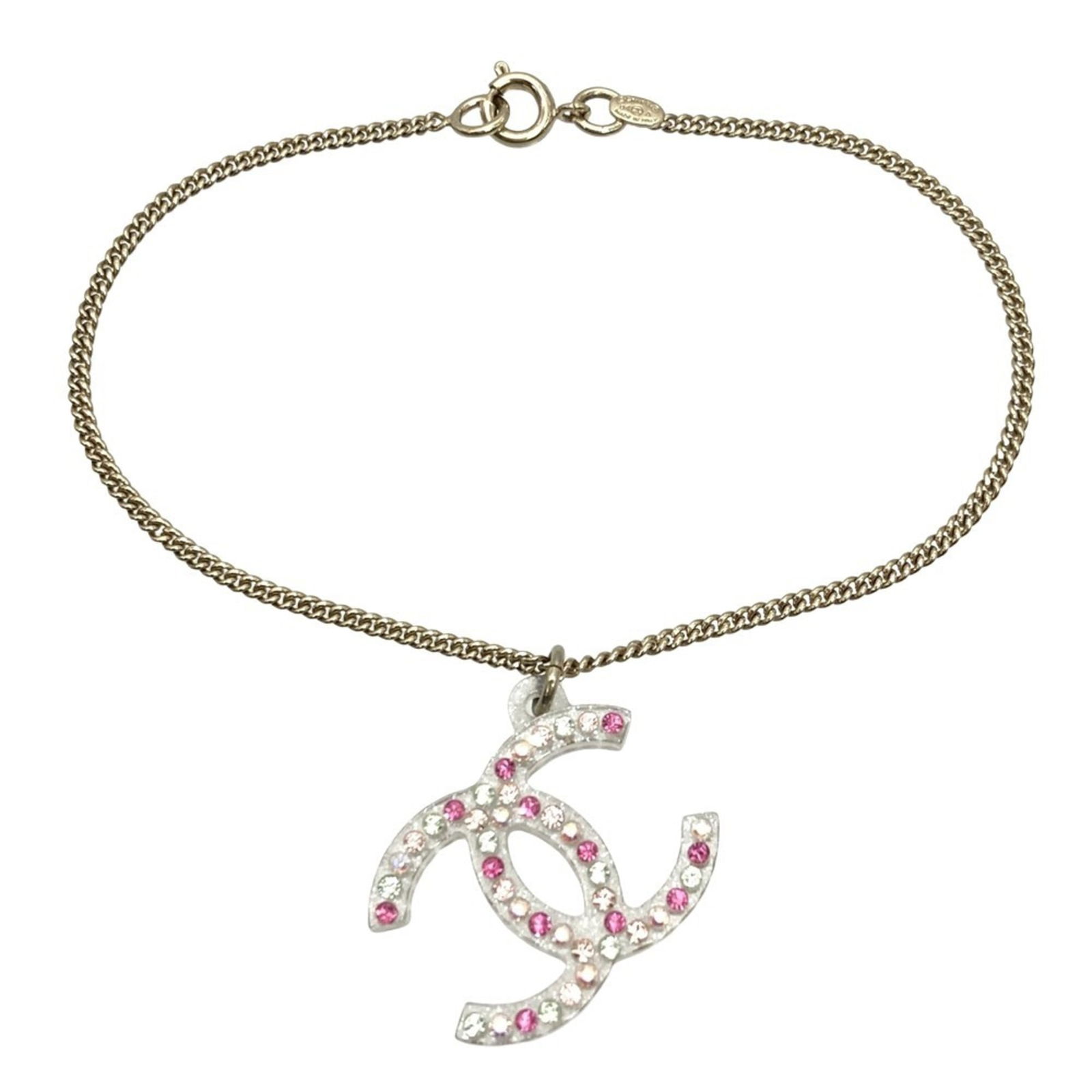 Chanel Charm Metal Bracelet: Chanel Charm Metal Bracelet Add a touch of timeless elegance to your wardrobe with this stunning Chanel Charm Metal Bracelet, boasting a vibrant multi-color design and sparkling rhinestone accents tha