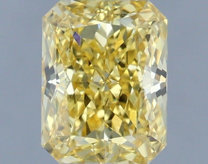 IGI Radiant 1.14ct Fancy Vivid Yellow VVS2 Loose Lab Diamond: IGI Radiant 1.14ct Fancy Vivid Yellow VVS2 Loose Lab Diamond Experience the vibrant beauty of nature with this stunning 1.14ct Fancy Vivid Yellow VVS2 lab diamond, certified by the International