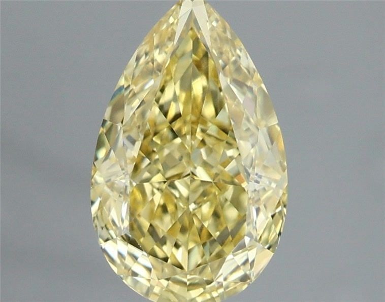 Loose Lab Diamond - IGI Pear 1.34ct Fancy Vivid Yellow VVS2: Loose Lab Diamond - IGI Pear 1.34ct Fancy Vivid Yellow VVS2 Experience the brilliance of nature in a lab-grown diamond, certified by IGI as Fancy Vivid Yellow with exceptional clarity and cut. This