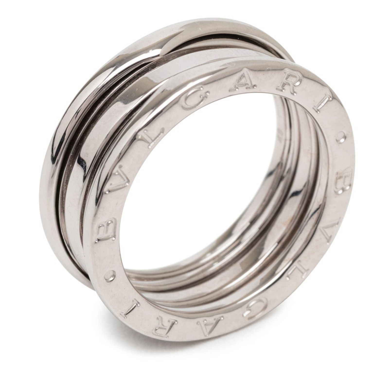 Ring Bvlgari Band: Ring Bvlgari Band A pre-owned Bvlgari band ring in excellent condition, showcasing the iconic Italian brand's signature style with a sleek and sophisticated design that adds a touch of glamour to any