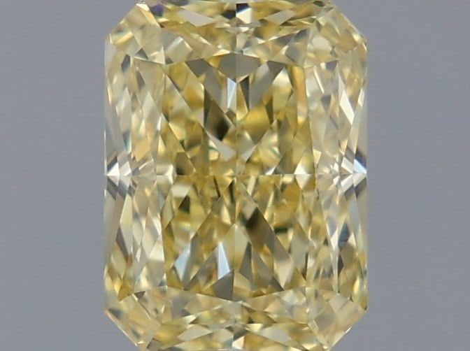 IGI Radiant 1.12ct Fancy Yellow VVS2 Loose Lab Diamond: IGI Radiant 1.12ct Fancy Yellow VVS2 Loose Lab Diamond Experience the warmth and uniqueness of a Fancy Yellow diamond, one of the rarest and most coveted colors in nature. This exquisite 1.12ct IGI-ce