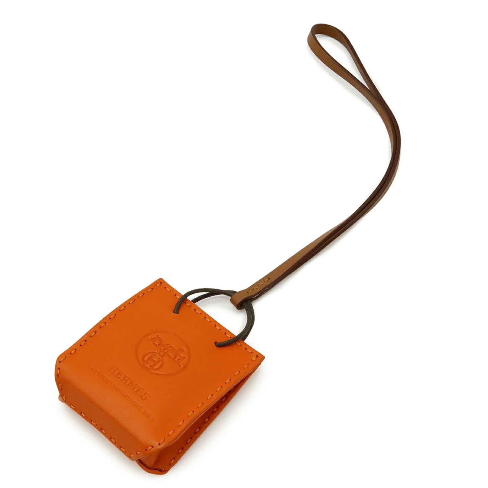 Agneau Milo Swift Leather Hermes Handbag: Agneau Milo Swift Leather Hermes Handbag The Agneau Milo Swift Leather Hermes Handbag is a stunning, pre-owned piece that exudes elegance and sophistication. With its rich Feu color and sleek gold acc