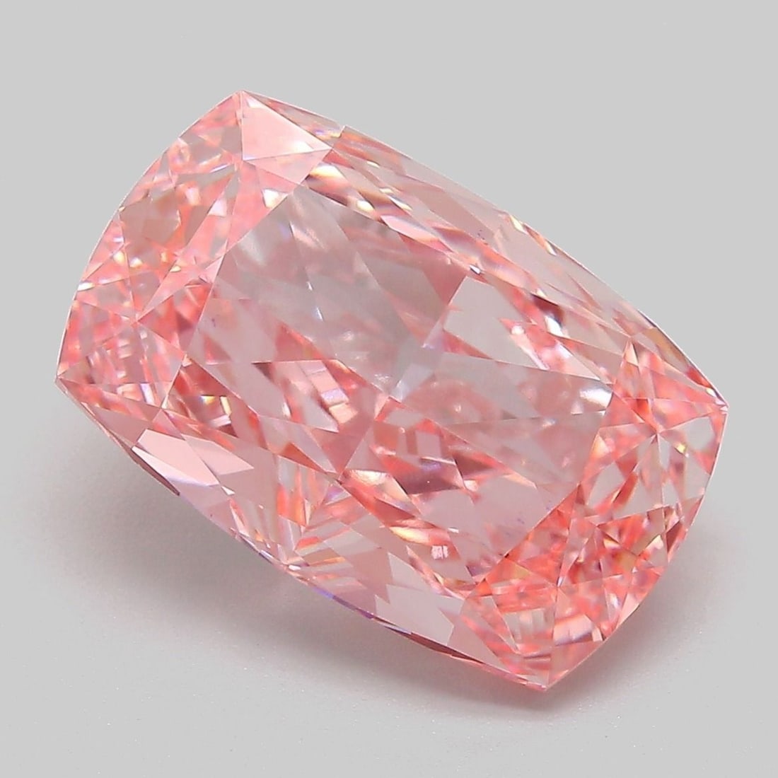 Loose Lab Diamond - IGI Cushion Modified 6.57ct Fancy Vivid Pink VVS2: Loose Lab Diamond - IGI Cushion Modified 6.57ct Fancy Vivid Pink VVS2 Experience the rare beauty of a lab-grown diamond, certified by the International Gemological Institute (IGI) as Fancy Vivid Pink,