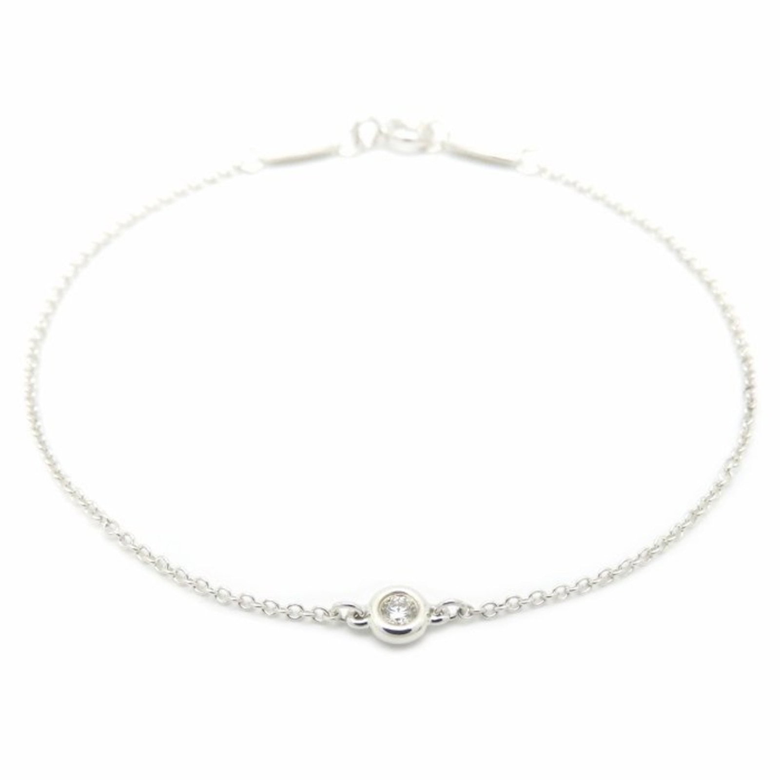925 Tiffany Charm Bracelet Silver: 925 Tiffany Charm Bracelet Silver Elevate your style with the timeless elegance of Tiffany charm bracelet, crafted from sterling silver 925 and adorned with a beautiful diamond stone. This pre-loved p