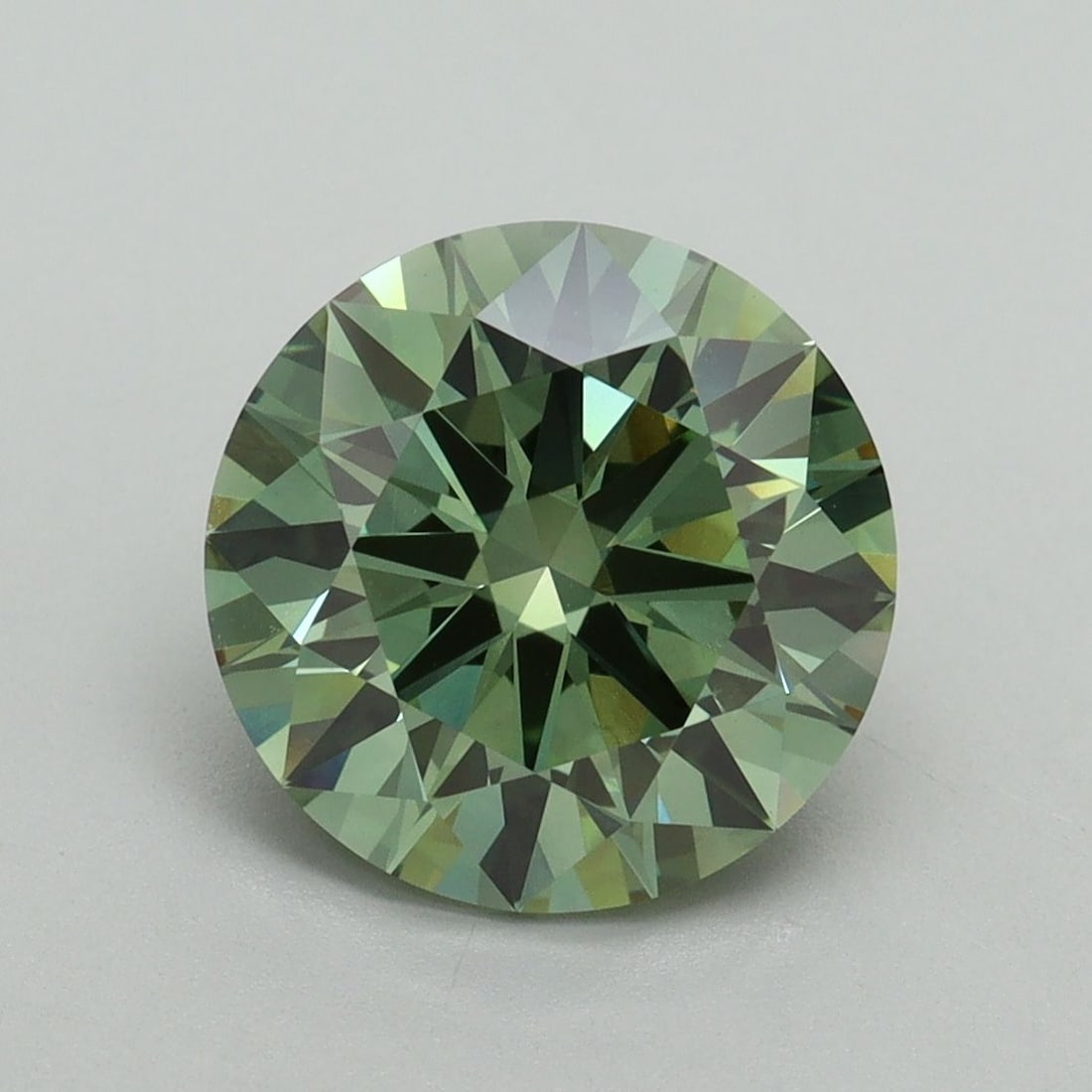 IGI Round 3.05ct Fancy Vivid Green VVS2 Ideal Loose Lab Diamond: IGI Round 3.05ct Fancy Vivid Green VVS2 Ideal Loose Lab Diamond Experience the breathtaking beauty of a lab-grown diamond, certified by IGI as Fancy Vivid Green with an exceptional cut, polish, and